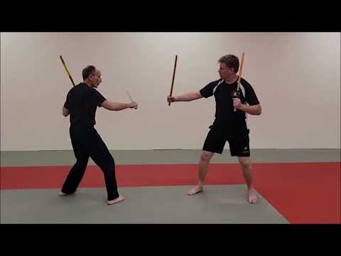 "running attacks" of Kali. Double (Sinawali) Stick drill.