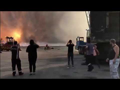 Slow-motion Beirut explosion from waterfront near blast site