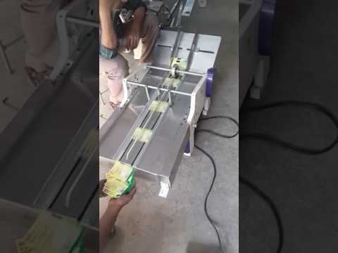 Stacking Auto Feeding High Speed Coder for Pouches, Cartons, Labels