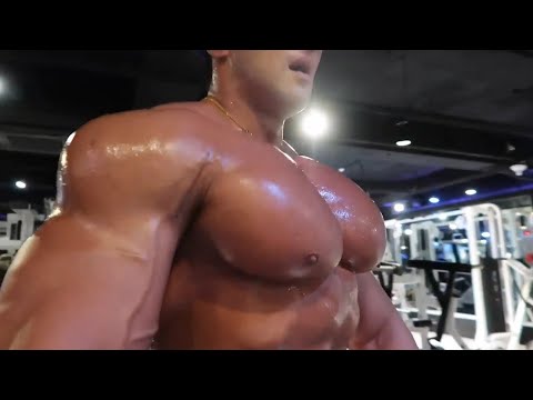 Korean Bodybuilder Chul Soon Shows Off his Big Chest Muscles.