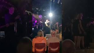 Russell Crowe and Britney Theriot with his band Indoor Garden Party in Byron Bay.