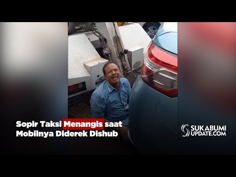 Sopir Taksi Menangis saat Mobilnya Diderek Dishub