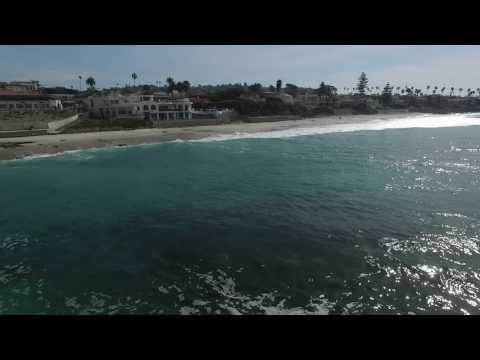 Horseshoe drone footage of surf and water