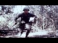 US 199th Light Infantry Brigade troops armed with M-16 rifles on jungle trail dur...HD Stock Footage
