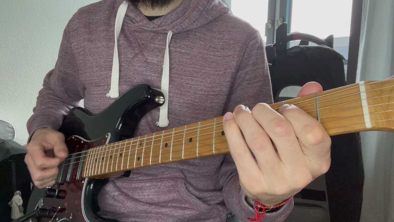 Guitarist playing the bluesy intro licks to Black Velvet by Alannah Myles