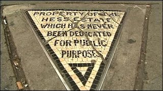 Tiny triangle-shaped private property on NYC sidewalk