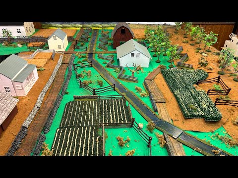 Battle For The Bliss Farm in 54mm miniature war game figures first video setting up the game.