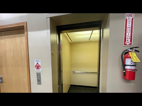 Older MEI Hydraulic Elevator @ Furniture Superstore in Rochester, MN