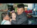 North Korean leader Kim Jong-un visits orphanage.