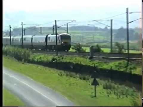 Class 90 heads a northbound train at Scout Green. 1998.