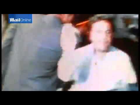 Juan Romero holds RFK in his final...