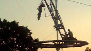 a women hanging by her neck