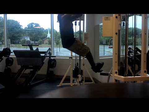 Hanging leg raises with 12.5 dumbbell 12 reps