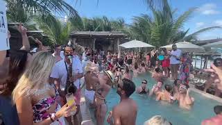 Tantra club in Tulum live saxophone at pool party