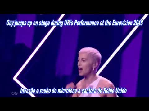 Guy jumps up on stage during UK’s Performance at the Eurovision 2018