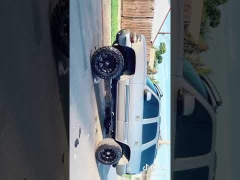 2001 Chevy Tahoe lifted on 35s and 20x12 moto metal wheels