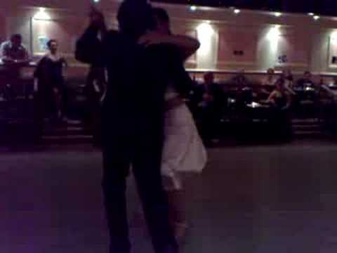  Alejandra Hobert  and  Adrian Veredice  are  dancing  to  the  tango  "  Quiero Verte Una Vez Mas  "