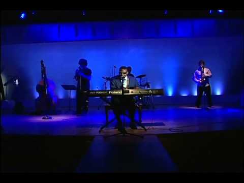 A talented young man portrays Ray Charles & Emily Yates as His Girlfriend in 