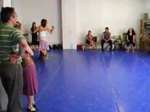  Osvaldo Zotto  and  Lorena Ermocida  are  dancing  to  the  tango  "  Manana Zarpa Un Barco  "
