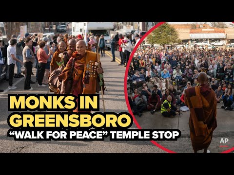 Visitors share emotional stories as peace-walk monks speak in Greensboro