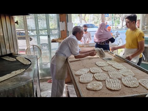 Authentic Barbari Bread Baked by Hard-Working Iranian Family - Delicious Recipe Revealed!