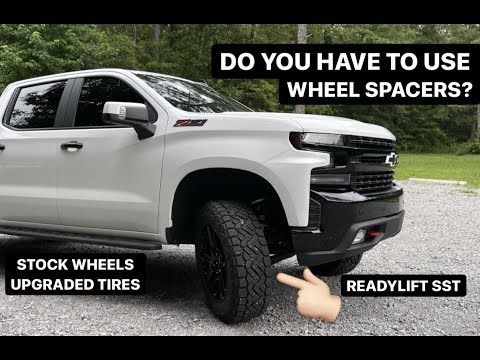 Do STOCK wheels fit with ReadyLIFT upper control arms???
