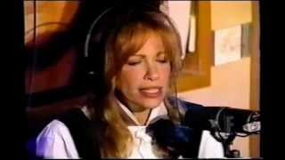 Carly Simon with Howard Stern in 1995