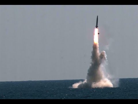 Algerian National Navy Kilo-class submarine firing exercise on a land based target
