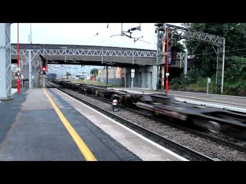 DB class 92009 'Marco Polo' departs with 92015 'D H Lawrence'