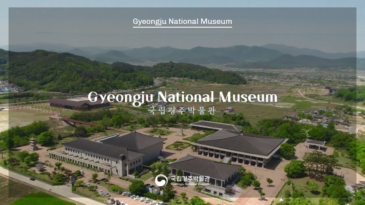 Inside the Gyeongju National Museum showing ancient Silla dynasty gold crowns and historical artifacts displayed in glass exhibition cases