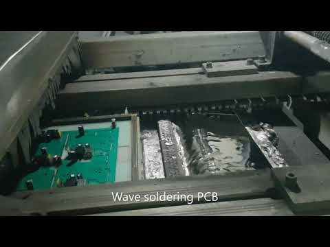 Wave Soldering Process for Electronics Manufacturing.  PCB Through-Hole Assembly