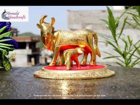 Nirmala handicrafts exporters metal gold finish cow & calf d...