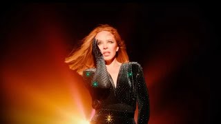 Kadr z teledysku Things We Do For Love tekst piosenki Kylie Minogue