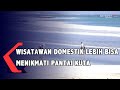 Wisatawan Di Pantai Kuta