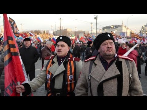 Putin joins celebration marking takeover of Crimea