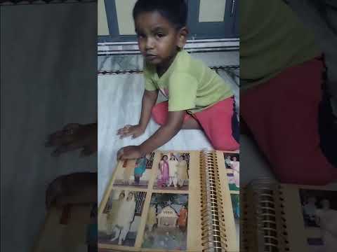 Richi does homework  with daddy help