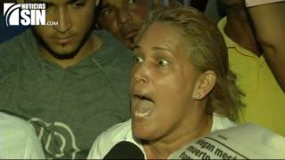 Familiares de taxista y mecánico muertos a manos de policía protestan en Baní