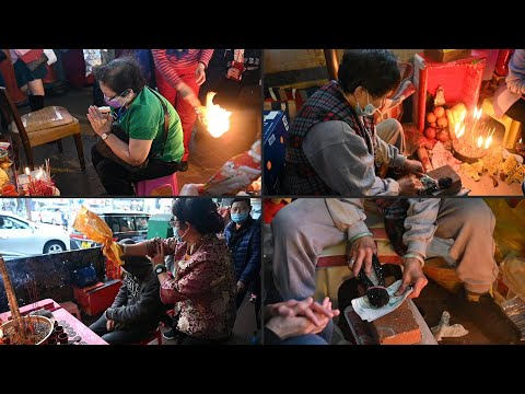 I put a spell on you: Hong Kongers vent political anger with old ritual | AFP
