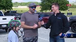 KETV meteorologist Luke Vickery checks out weather for Taco Ride