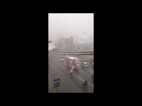 Hoarding fall down near matropoll in Karachi during rain