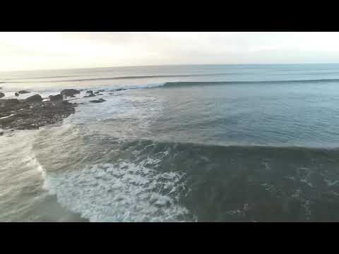 Drone footage of scenic views and waves at Borth 
