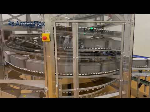 AmbaFlex AccuVeyor - AVh transporting frozen ice-cream buckets