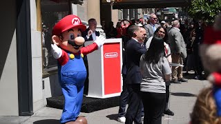 Mario Joins Ribbon Cutting Ceremony at Nintendo San Francisco Grand Opening (with Doug Bowser)
