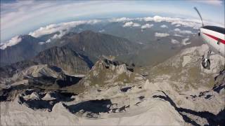 Flying in Papua SUGAPA - TIMIKA C208B PK LTF over Puncak Jaya,Glaciers & Grasberg Mine