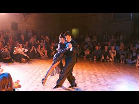  Roxana Suarez  and  Sebastian Achaval  are  dancing  to  the  milonga  "  Estampa De Varon  "  by  Juan D'Arienzo  at  Brussels Tango Festival  in  2014
