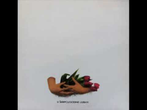 LJUBAV - U ŠKRIPCU (1982)