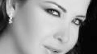 Download lagu Wana Bein Edik Nancy Ajram w/ lyrics ( translation) mp3 Download lagu Wana Bein Edik Nancy Ajram w/ lyrics ( translation) mp3