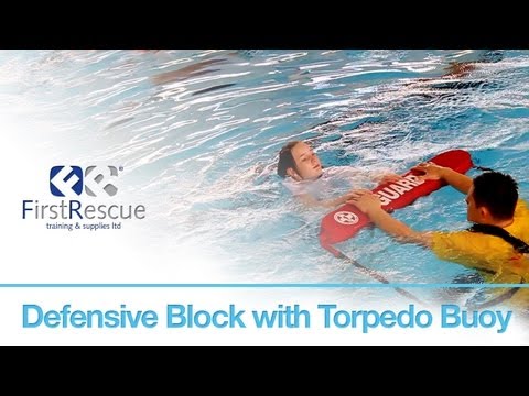 Defensive Block with Torpedo Buoy - RLSS National Pool Lifeguard 8th Edition