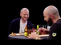 Binging with Babish Gets a Tattoo While Eating Spicy Wings Hot Ones thumbnail 3