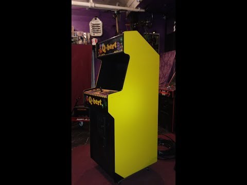 Working on restoring Qbert Arcade machine